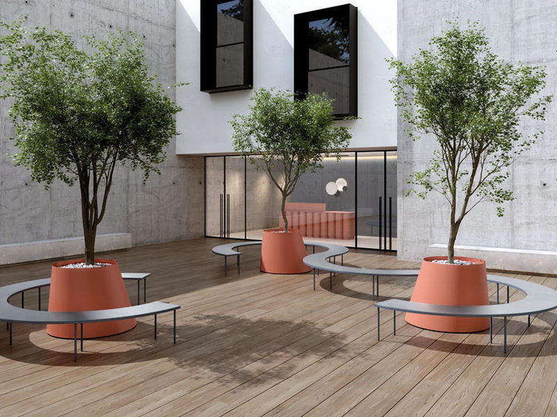 Complemento de oficina Systemtronic Conee Plant Pot en un espacio de trabajo