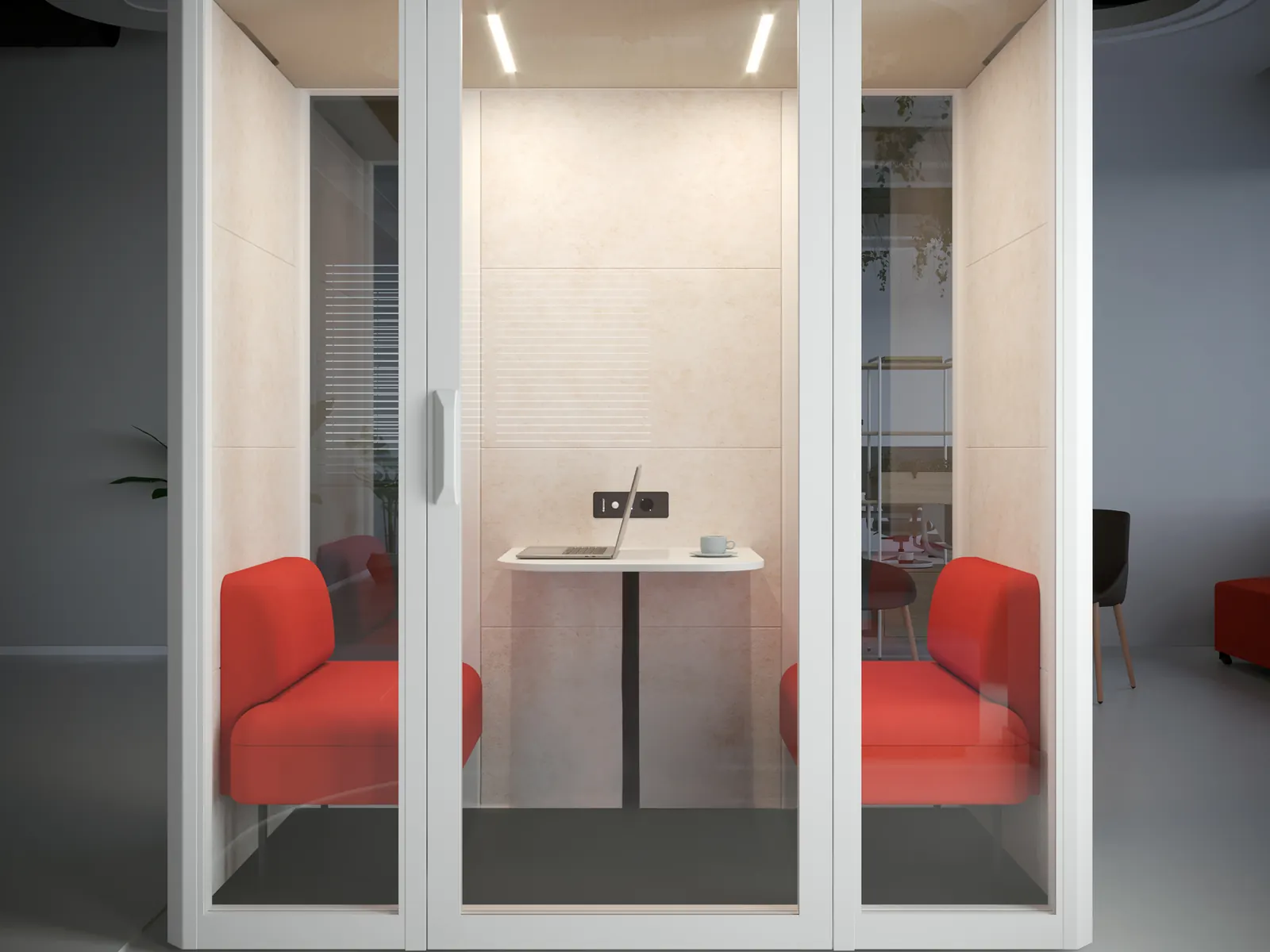 Interior de la Actiu Qyos 200 con mesa y dos asientos rojos