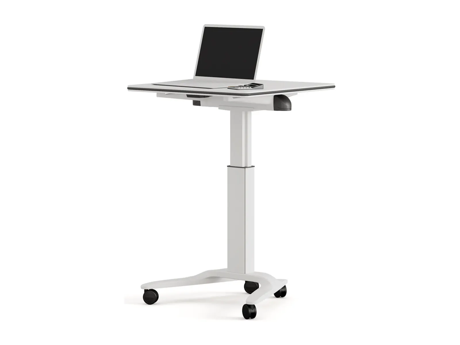 Actiu Talent 500 en posición elevada, de pie, con portátil sobre el tablero